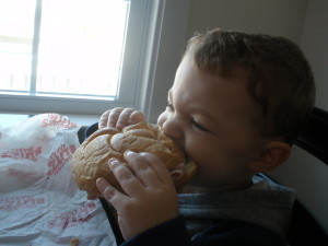 Jacob enjoying a sandwich.
