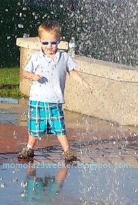 Boy splashing special needs prematurity, hand to hold, preemie babies 101, NICU, Life after NICU