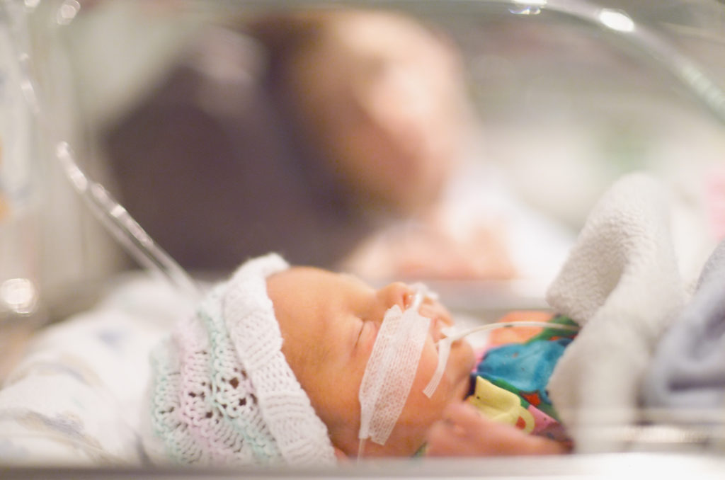 Premature baby boy in Intensive Care Unit at hospital, NICU, parent advisor, patient family advisor