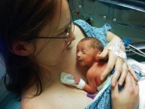 rowan Giles, one day old, hand to hold, fight like a preemie