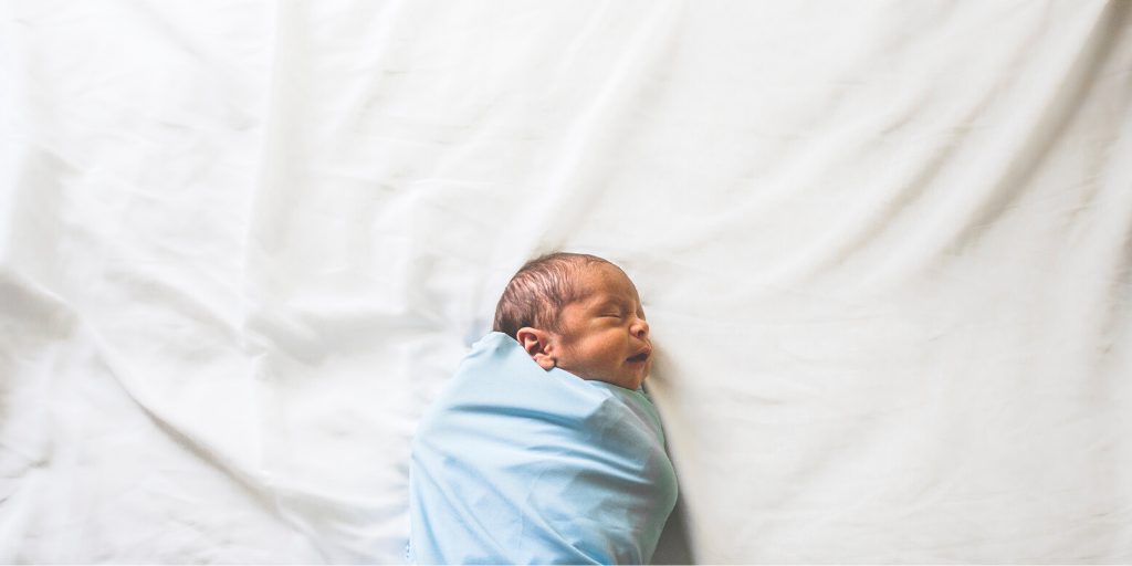 sleep training your preemie, swaddled baby