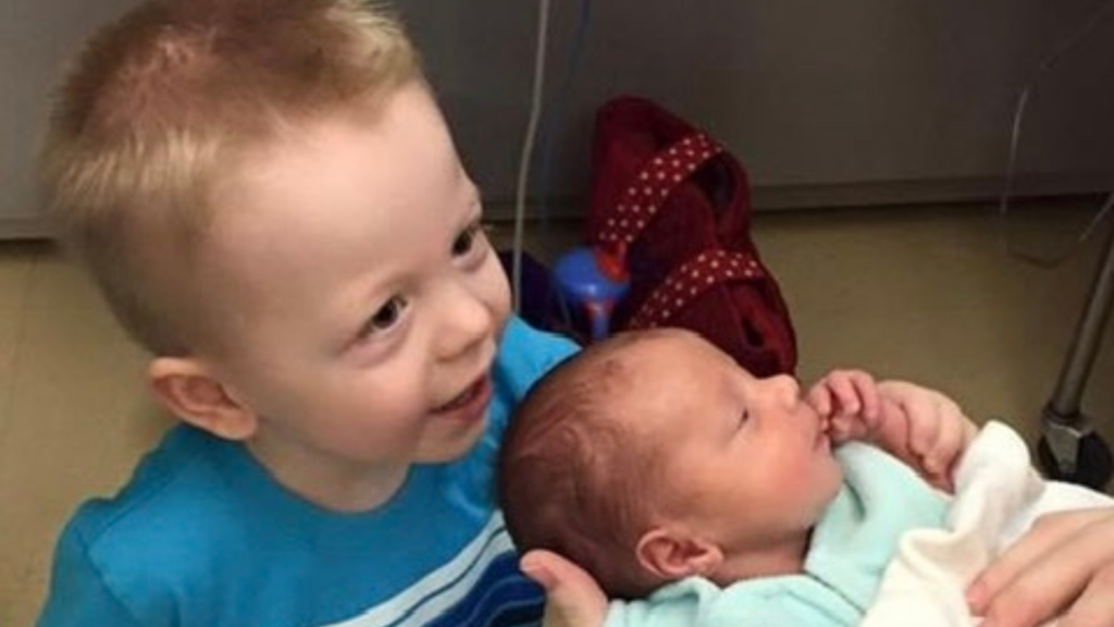 NICU, siblings, hand to hold