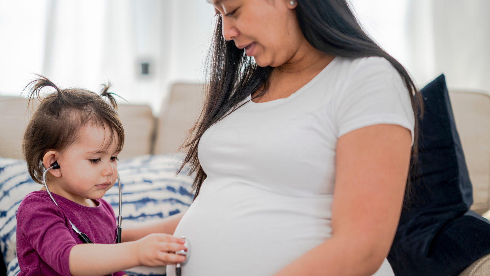 pregnancy after a NICU stay, hand to hold