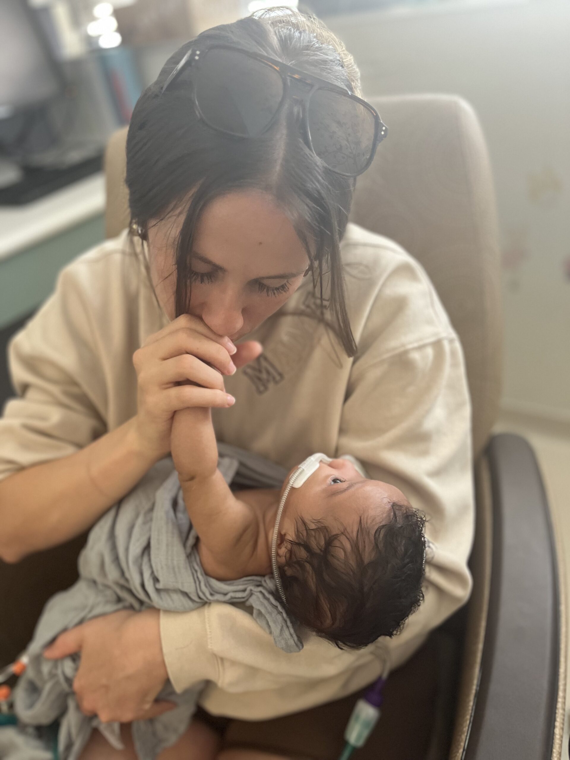 Hand to Hold, NICU Advocacy, NICU mom holding NICU baby