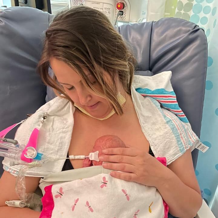 NICU mom holding NICU baby kangaroo care in the NICU